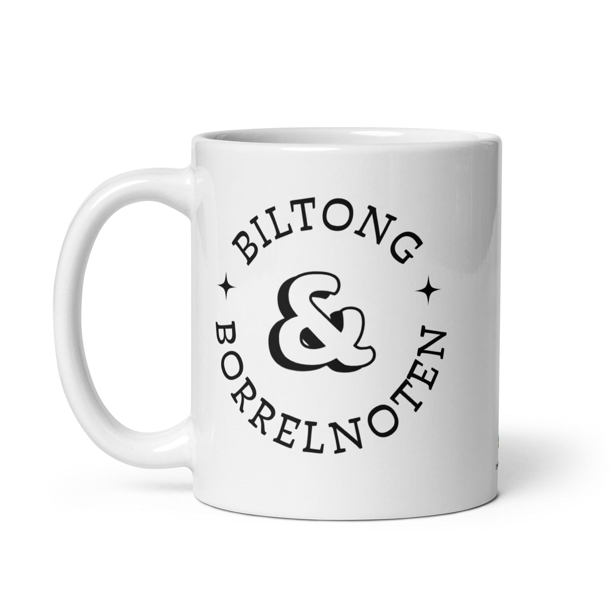 White glossy ceramic mug with black typographic design reading “Biltong & Borrelnoten,” funny South African and Dutch crossover mug.